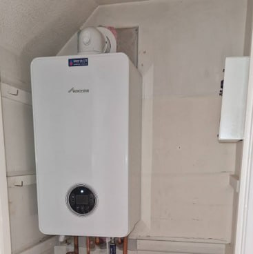 Worcester Bosch combi boiler installed in airing cupboard